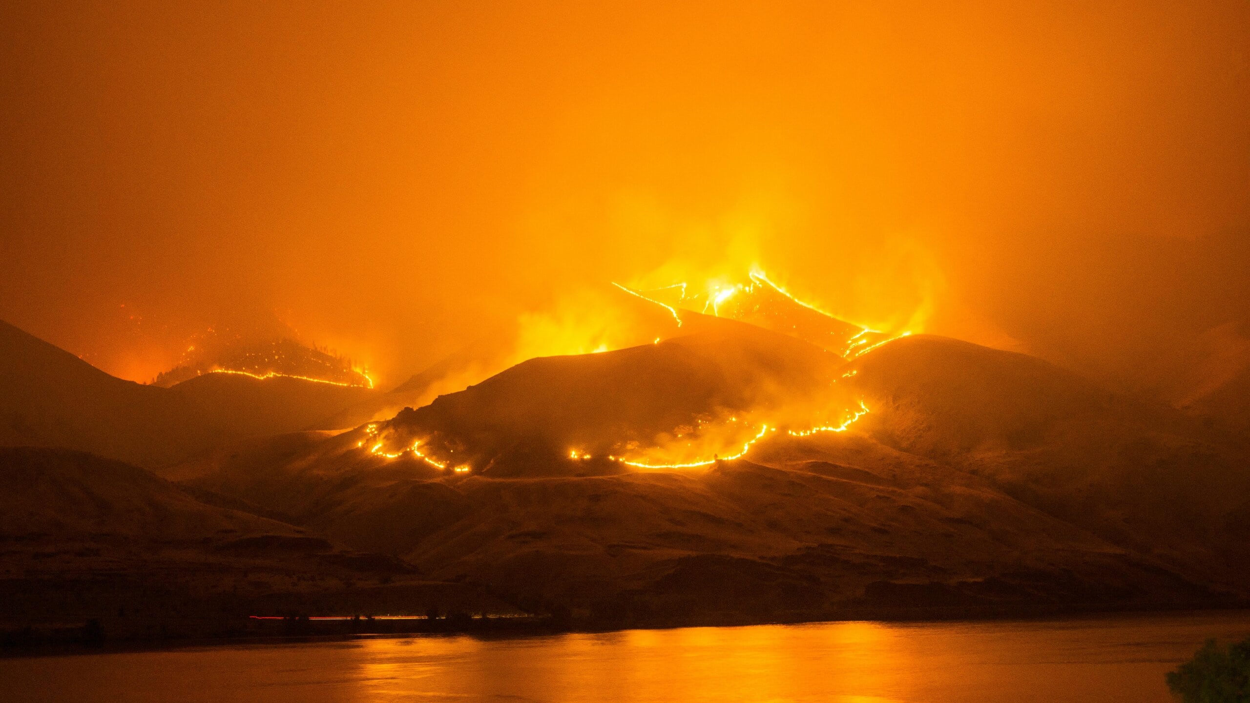 Wildfire on a mountain ridge line